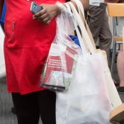 Place marketing information inside bags